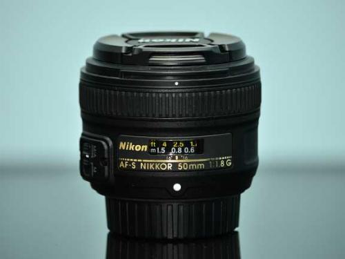 vendo lente Nikon 50mm 18 VR valor 4mil lemp - Imagen 1
